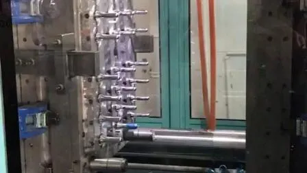 Машина для изготовления бутылок-преформ, машина для литья пластмасс под давлением